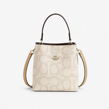 Co_a_ch Elegant Cream Monogram Bag with Top Handle